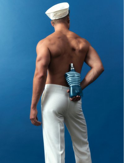 Male model back with Le Male bottle