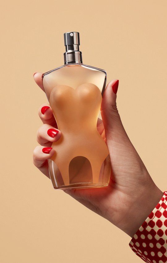 classique fragrance in the hand