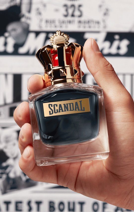 scandal pour homme fragrance in the hand