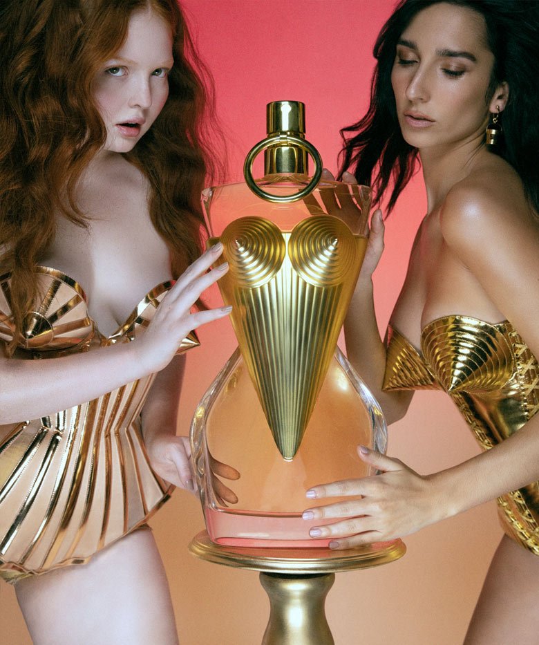 Gaultier Divine with two models with pink background