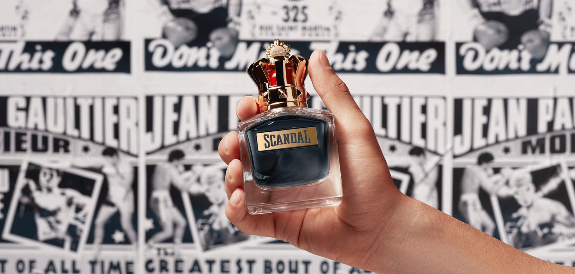 scandal pour homme fragrance in the hand